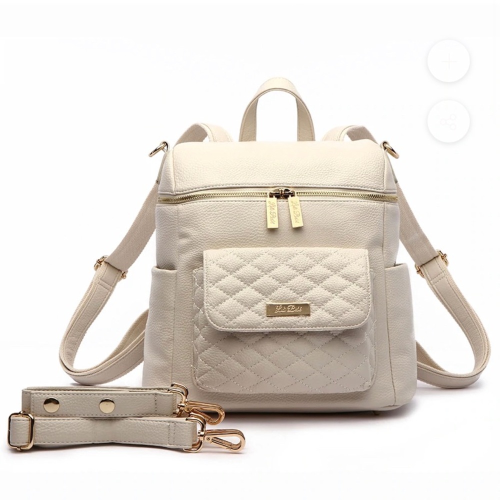 White luli bebe petit backpack diaper bag